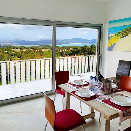 Panohome Porto Pino Bagian luar foto