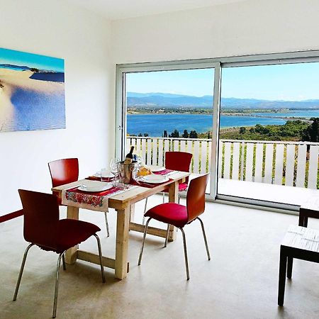 Panohome Porto Pino Bagian luar foto