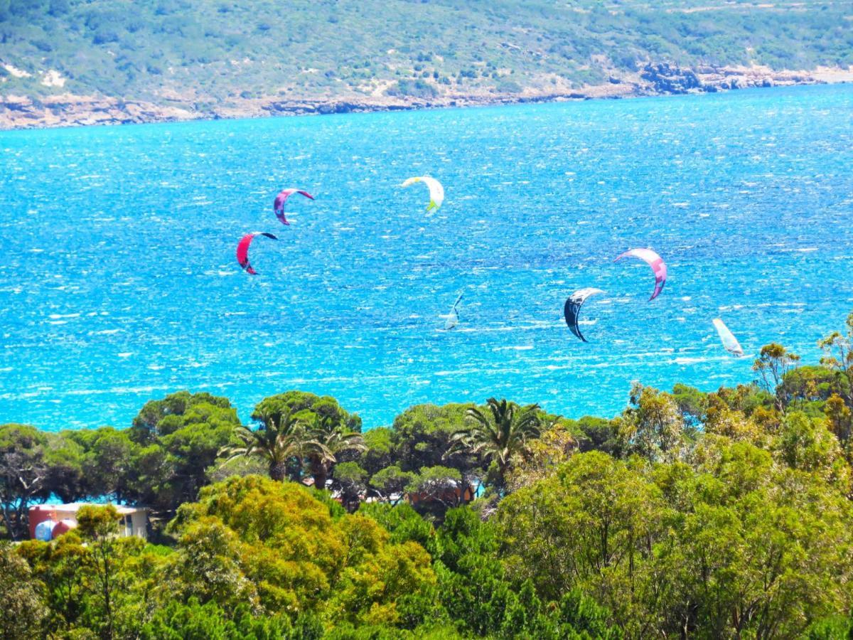 Panohome Porto Pino Bagian luar foto