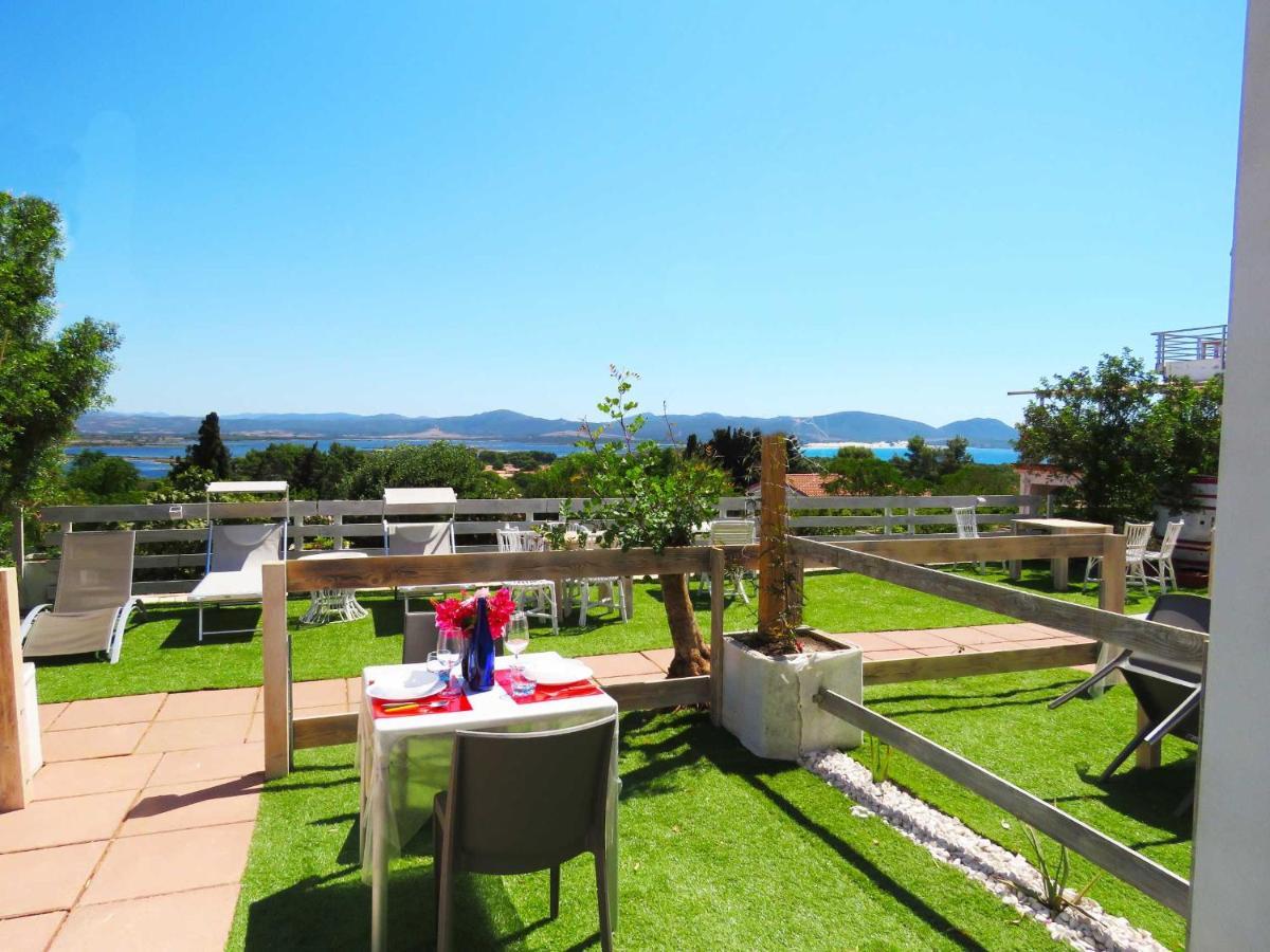 Panohome Porto Pino Bagian luar foto