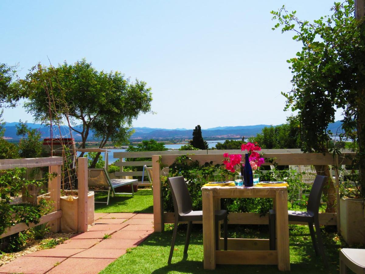 Panohome Porto Pino Bagian luar foto