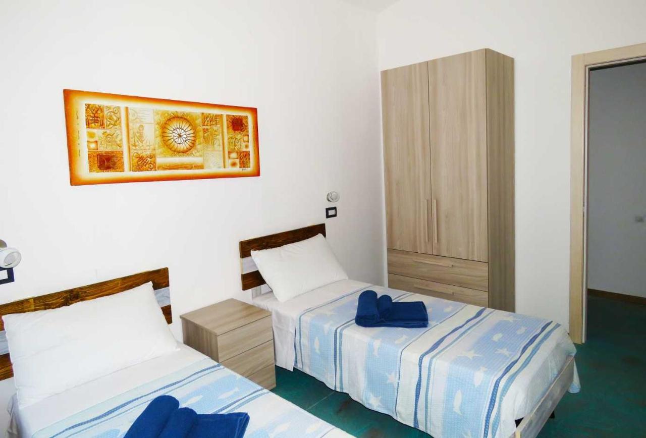 Panohome Porto Pino Bagian luar foto