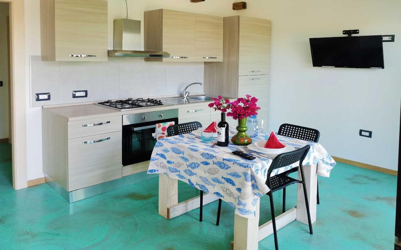 Panohome Porto Pino Bagian luar foto