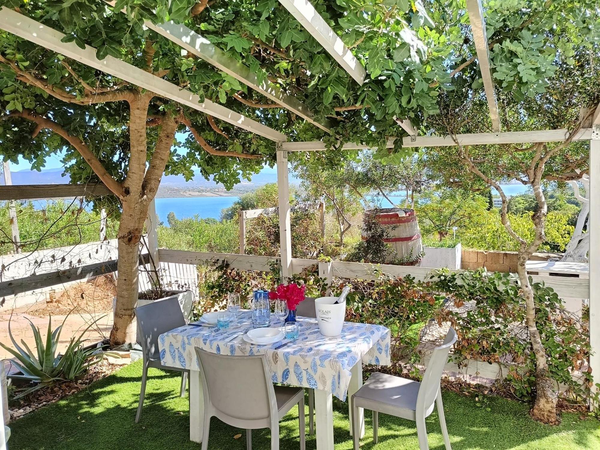 Panohome Porto Pino Bagian luar foto