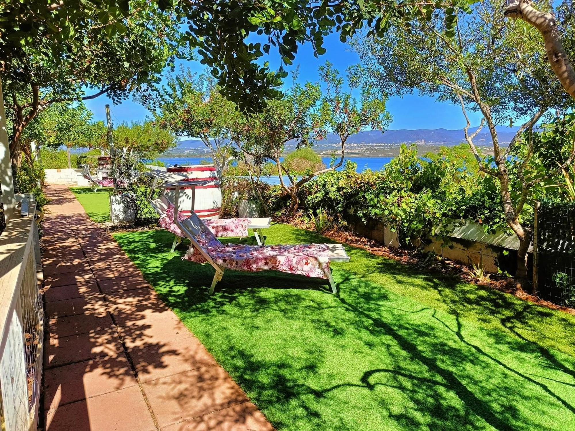 Panohome Porto Pino Bagian luar foto