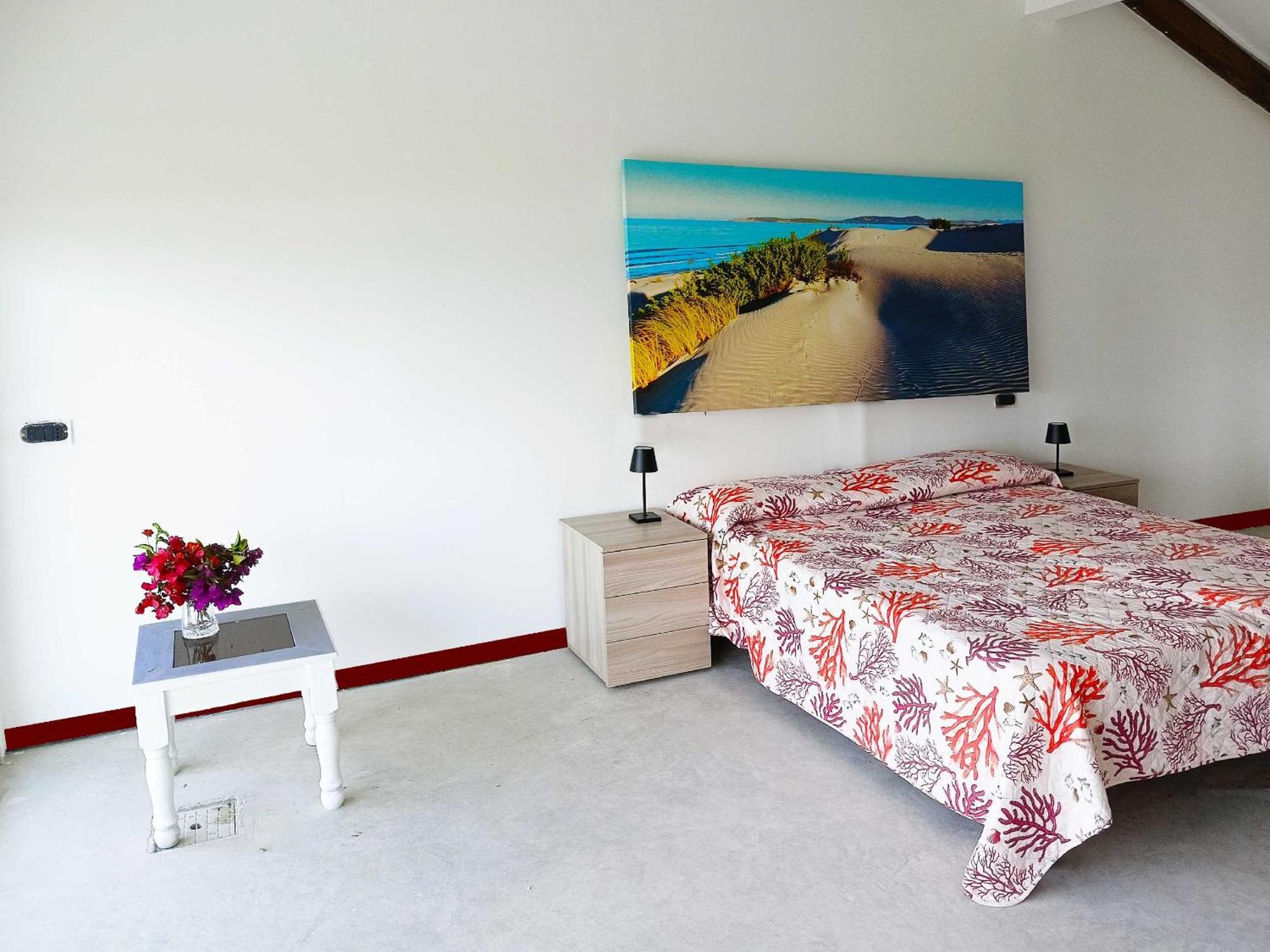 Panohome Porto Pino Bagian luar foto