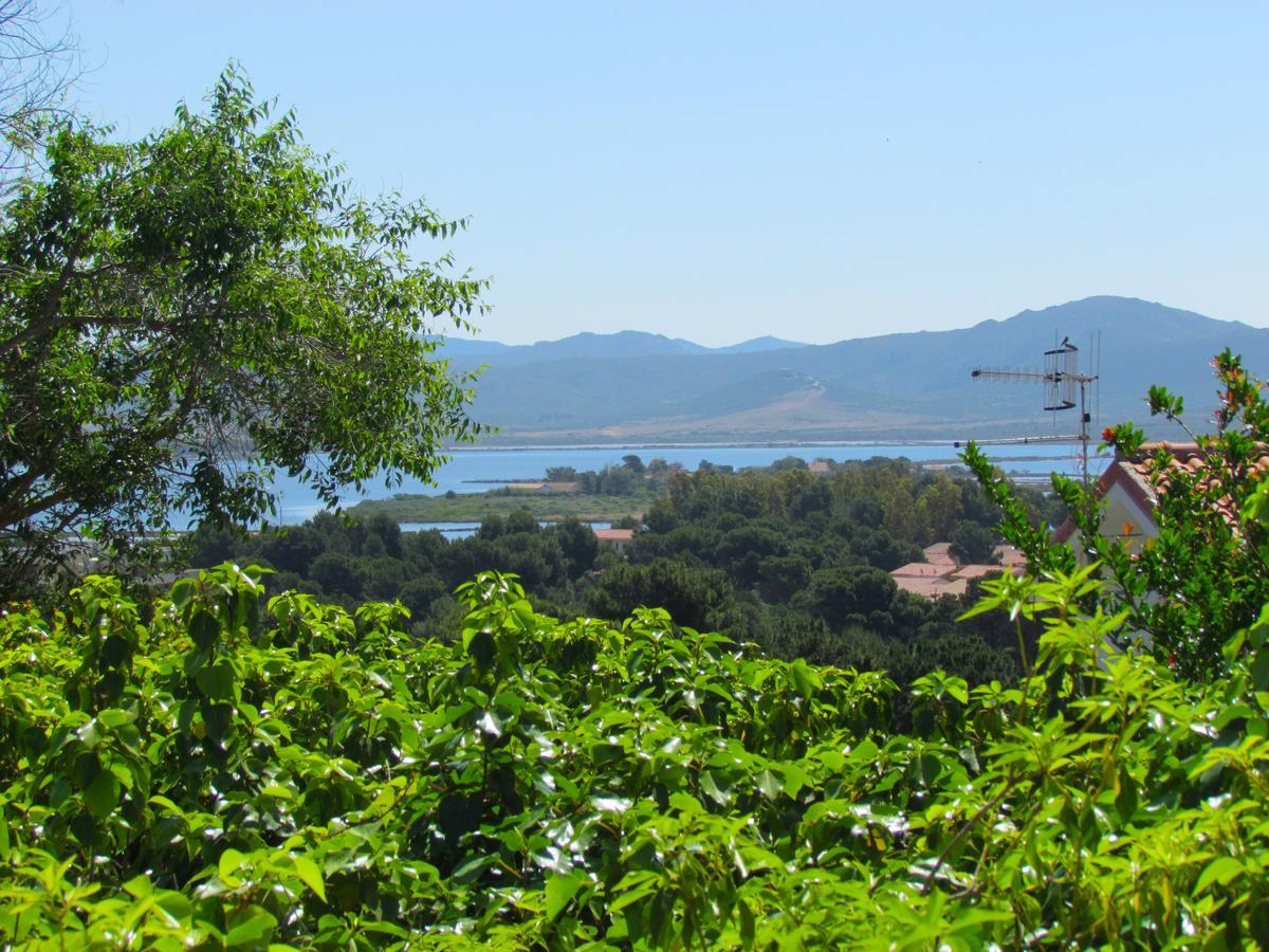 Panohome Porto Pino Bagian luar foto