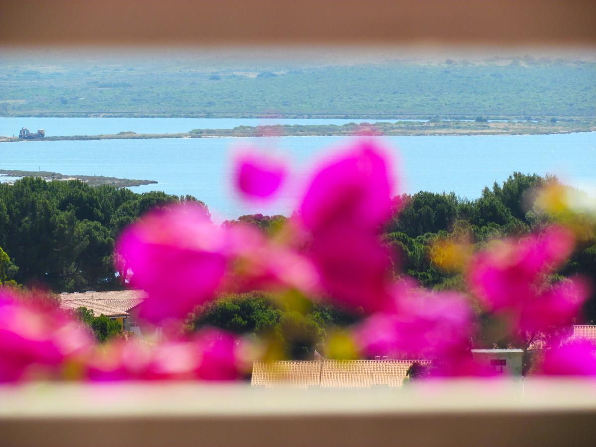 Panohome Porto Pino Bagian luar foto