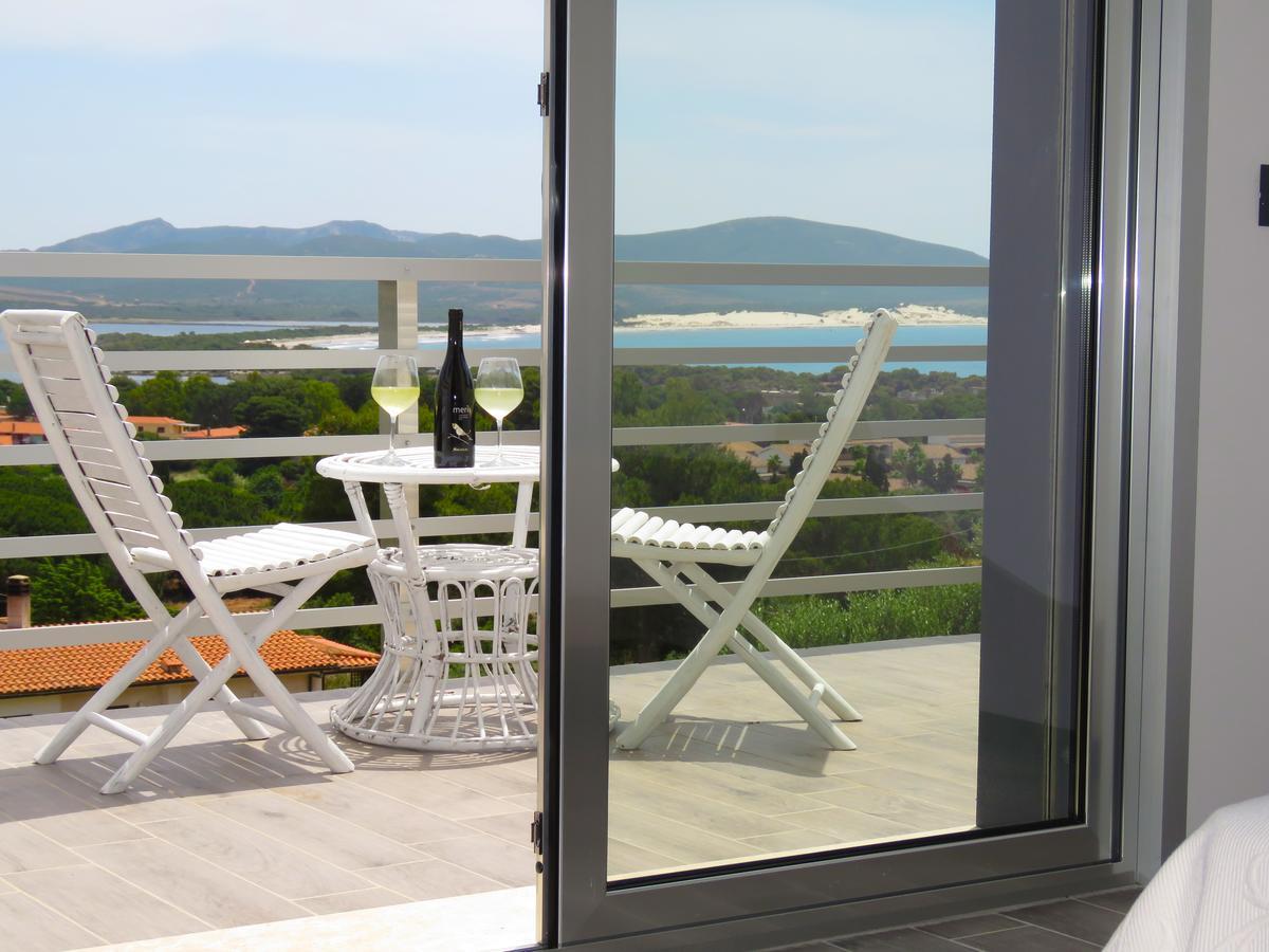 Panohome Porto Pino Bagian luar foto