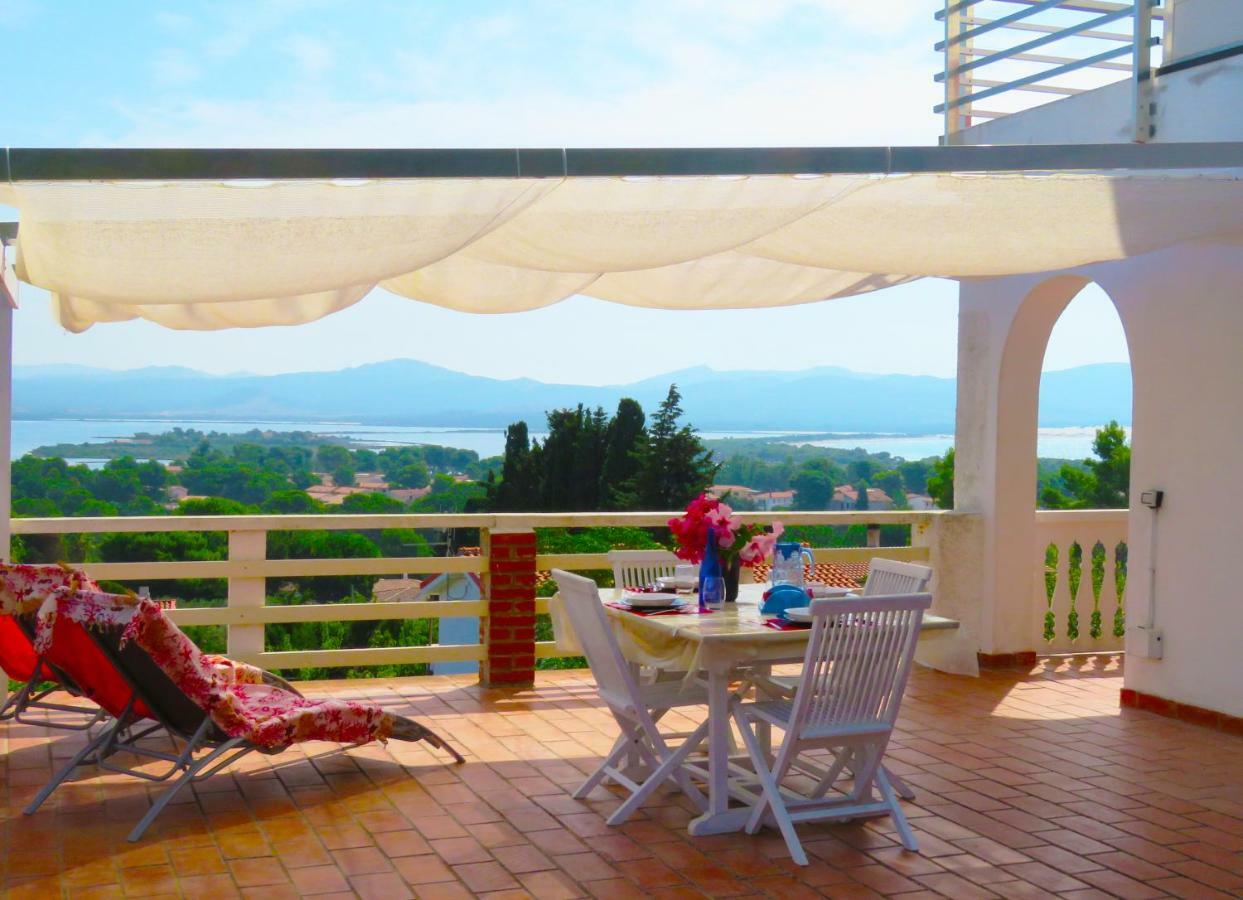 Panohome Porto Pino Bagian luar foto